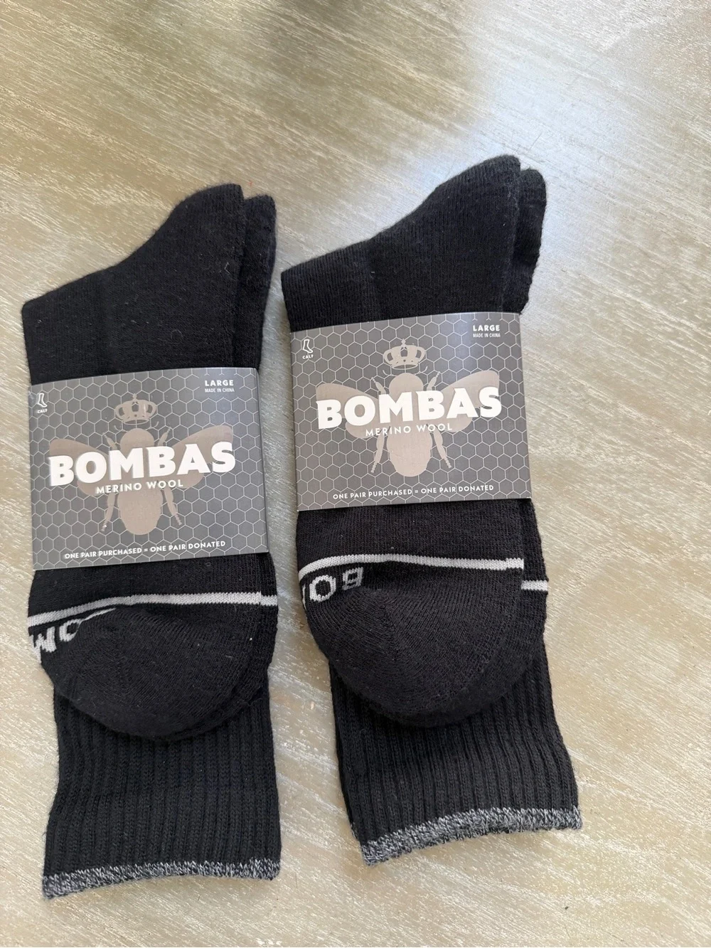 Bombas Men’s Merino Wool Black Calf Socks. New with tags. Size large. Two pair.